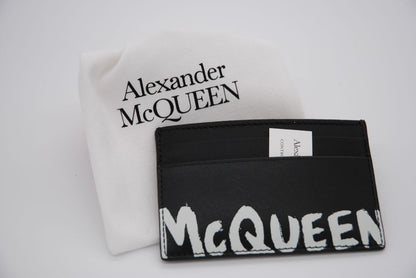 black and white lettering Alexander McQueen card holder Alexander McQueen card holder NIB, 2.73 in h x 4.29 in w