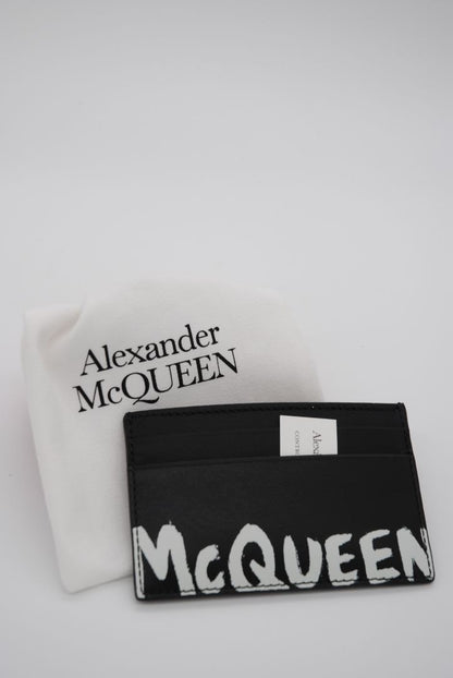 black and white lettering Alexander McQueen card holder Alexander McQueen card holder NIB, 2.73 in h x 4.29 in w