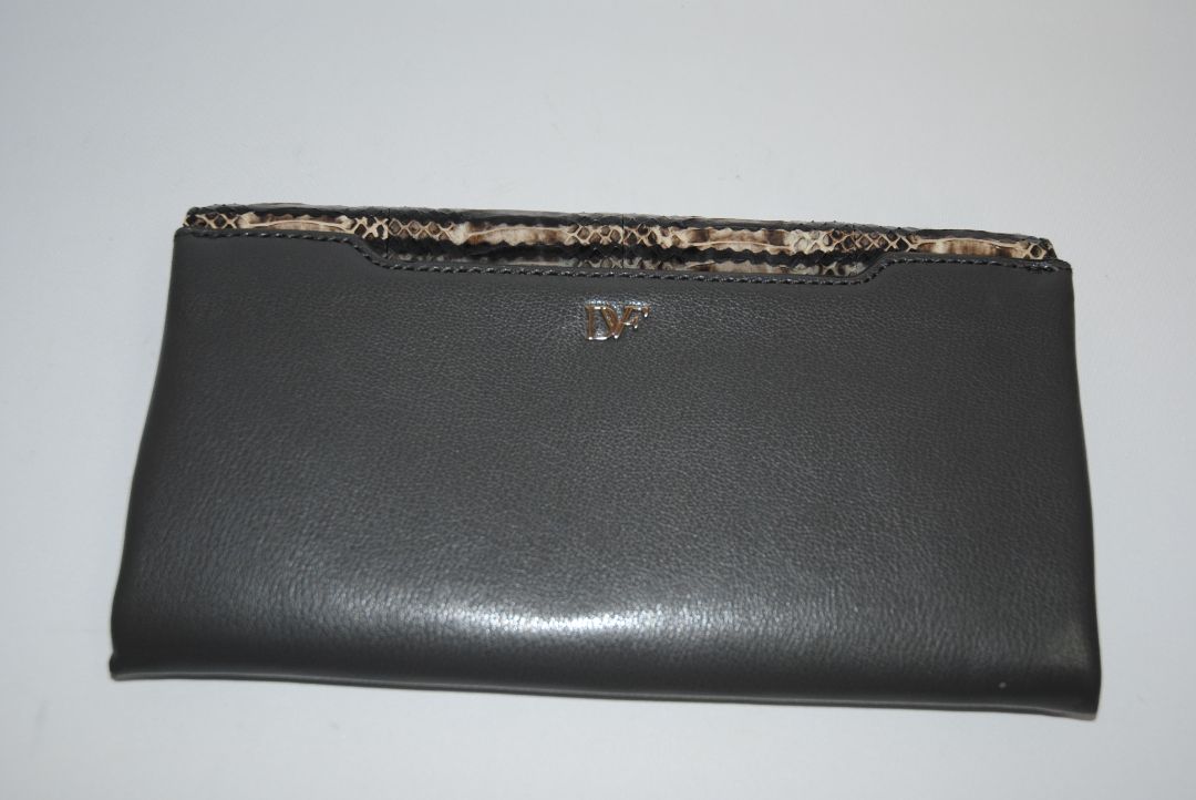 snake skin and gray Diane von Furstenberg clutch, Length: 11” Height: 6” Depth: 1.5” Closure: Bar frame with hinge clasp