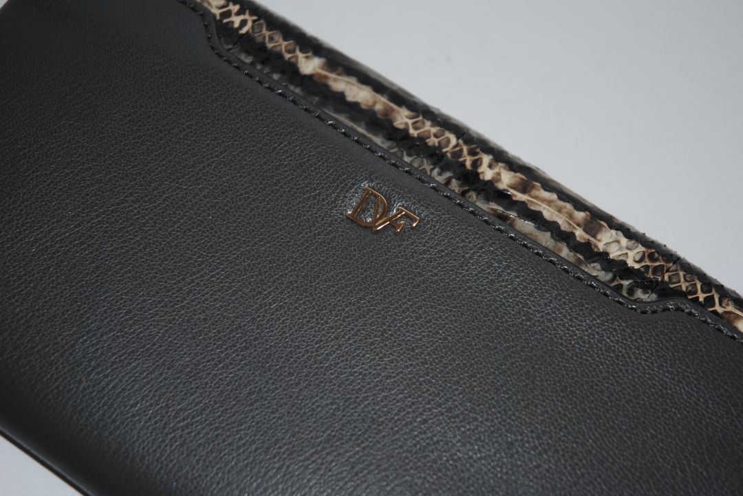 snake skin and gray Diane von Furstenberg clutch, Length: 11” Height: 6” Depth: 1.5” Closure: Bar frame with hinge clasp