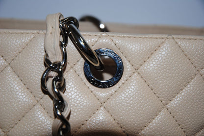 Beige Caviar Chanel Grand Shopping Tote (GST) in Caviar Leather with silver-tone, Length: 13.5 in Height: 10 in Depth: 5 in Handle Drop: 9 in