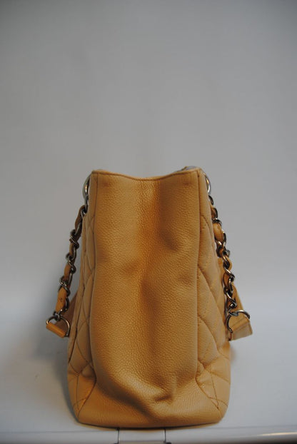 Beige Caviar Chanel Grand Shopping Tote (GST) in Caviar Leather with silver-tone, Length: 13.5 in Height: 10 in Depth: 5 in Handle Drop: 9 in
