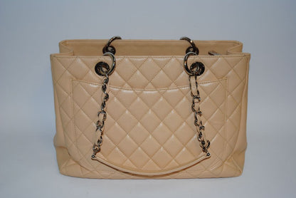 Beige Caviar Chanel Grand Shopping Tote (GST) in Caviar Leather with silver-tone, Length: 13.5 in Height: 10 in Depth: 5 in Handle Drop: 9 in