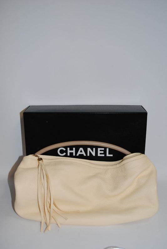 Ivory Chanel hobo shoulder leather tassel, Length: 16 in Height: 10 in Depth: 5 in Handle Drop: 9 in