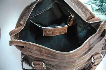 brown Balenciaga Classic City Bag – Distressed Brown Leather with Silver Hardware, Length: 15 in (38 cm) Height: 10 in (25 cm) Depth: 5.5 in (14 cm) Handle Drop: 4 in Strap Drop: 10–12 in (adjustable, removable shoulder strap)