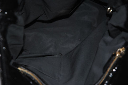 black Stella McCartney grommet patent eco tote, Length: 18 in (46 cm) Height: 16 in (41 cm) Depth: 5 in (13 cm) Top Handle Drop: 4 in Shoulder Strap Drop: Adjustable up to 20 in (Ideal for top-handle or crossbody wear)
