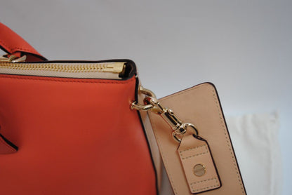 blush and coral Chloe colorblock leather tote, Length: 13.5 in Height: 9.5 in Depth: 6 in Handle Drop: 5 in Strap Drop: 17 in (adjustable, removable wide strap)