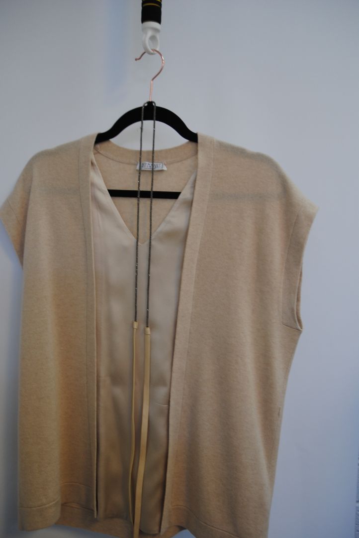 beige Brunello Cucinelli cashmere and silk belted top, Bust (flat): 19 in Length (shoulder to hem): 26 in (front), 24.5 in (back) Shoulder Width: 17 in Fit: Relaxed, draped silhouette Closure: Open front with inner satin tie detail