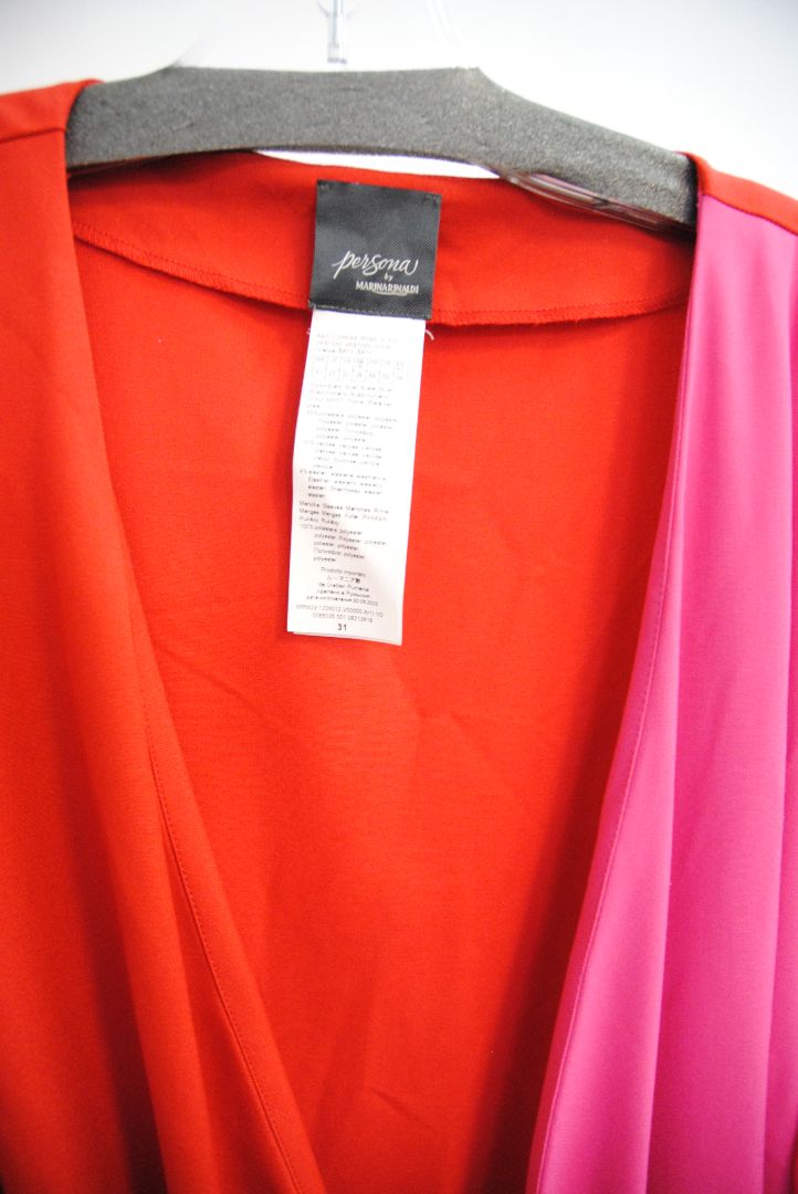 pink and red Marina Rinaldi Persona designer dress, Bust: 22.5 in (flat) Waist (adjustable tie): up to 21 in Hip: 24 in Length: 50 in (shoulder to hem) Sleeve Length: 24.5 in Fit: Relaxed wrap fit with tie belt
