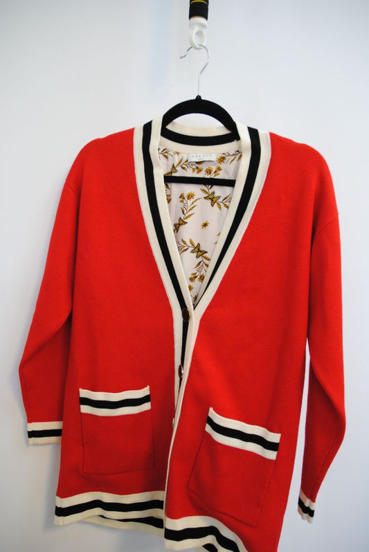 red Sandro knit cardigan, Bust (flat): 19.5 in Length (shoulder to hem): 27 in Sleeve Length: 21.5 in Shoulder to Shoulder: 17 in Fit: Relaxed, hip-length silhouette Closure: Button-down front
