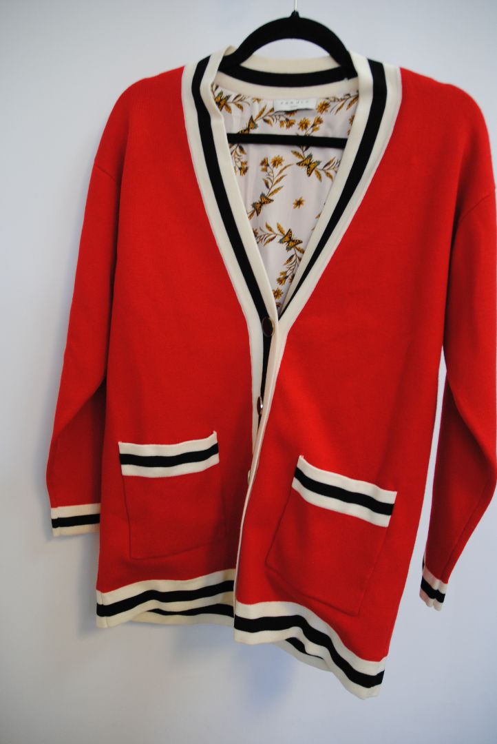 red Sandro knit cardigan, Bust (flat): 19.5 in Length (shoulder to hem): 27 in Sleeve Length: 21.5 in Shoulder to Shoulder: 17 in Fit: Relaxed, hip-length silhouette Closure: Button-down front
