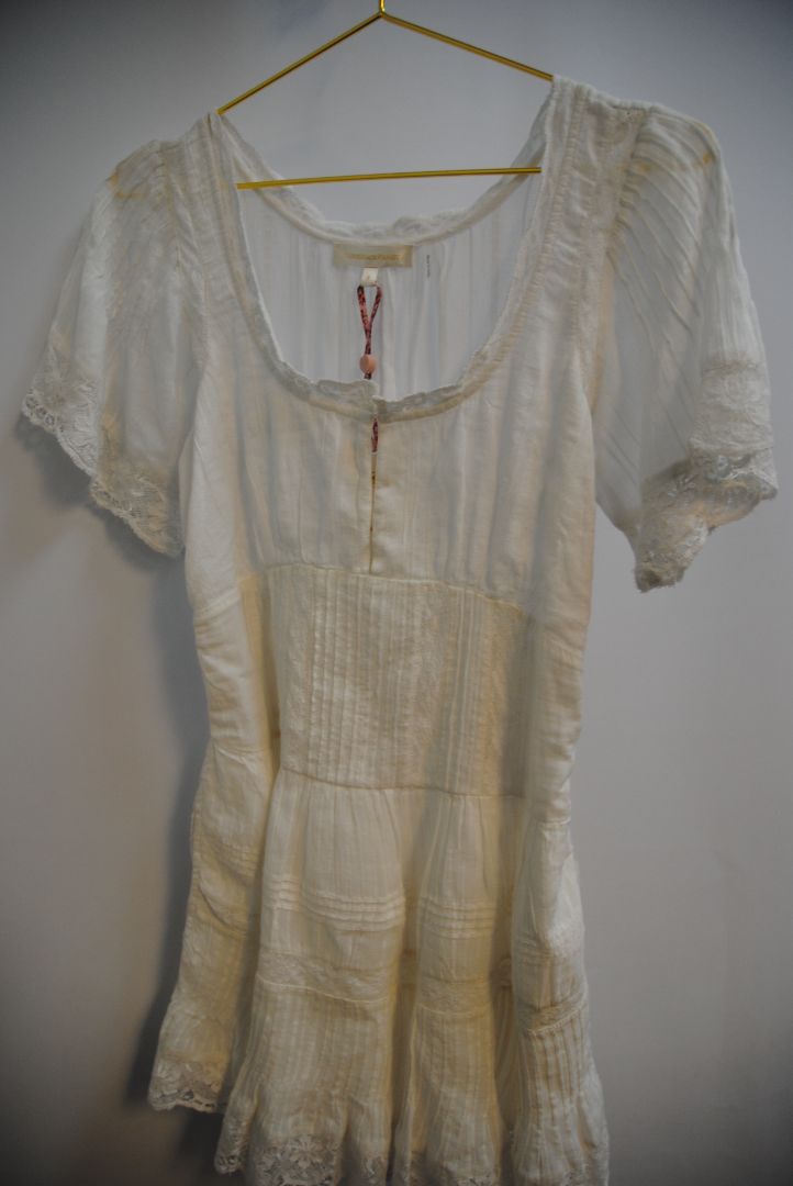 white Love Shack Fancy gwen pintuck dress, Bust: 34 in Waist: 28 in (elastic smocking in back) Length: 31 in (shoulder to hem) Sleeve Length: 10 in Fit: Flowy, relaxed fit with slight empire waist