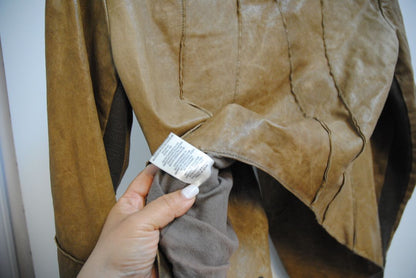 brown Helmut Lang blazer leather, Shoulder to Shoulder: 16 in Bust: 38 in Sleeve Length: 24 in Length (Front): 22 in (asymmetrical hem) Length (Back): 20 in Fit: Structured yet slightly relaxed