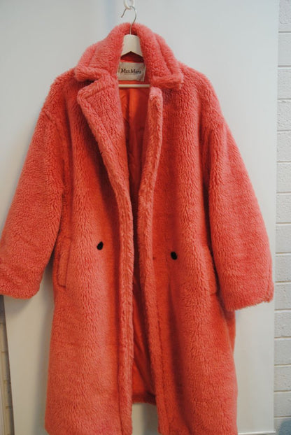 pink alpaca Max Mara Teddy bear icon coat, Length: Approx. 44 in Sleeve Length: Approx. 23 in Shoulder Width: Approx. 22 in Bust (pit to pit): Approx. 26 in Fit: Oversized cocoon silhouette
