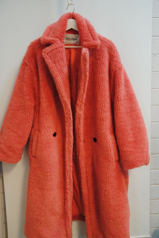 pink alpaca Max Mara Teddy bear icon coat, Length: Approx. 44 in Sleeve Length: Approx. 23 in Shoulder Width: Approx. 22 in Bust (pit to pit): Approx. 26 in Fit: Oversized cocoon silhouette