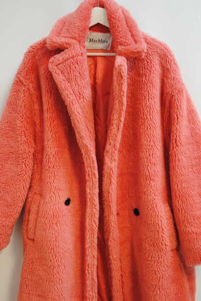 pink alpaca Max Mara Teddy bear icon coat, Length: Approx. 44 in Sleeve Length: Approx. 23 in Shoulder Width: Approx. 22 in Bust (pit to pit): Approx. 26 in Fit: Oversized cocoon silhouette