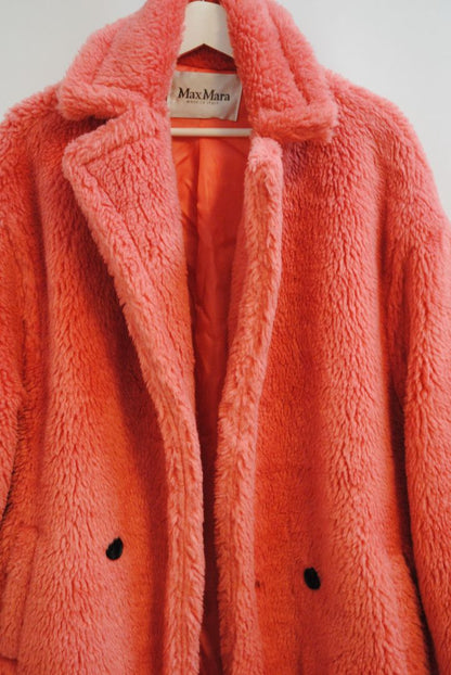pink alpaca Max Mara Teddy bear icon coat, Length: Approx. 44 in Sleeve Length: Approx. 23 in Shoulder Width: Approx. 22 in Bust (pit to pit): Approx. 26 in Fit: Oversized cocoon silhouette