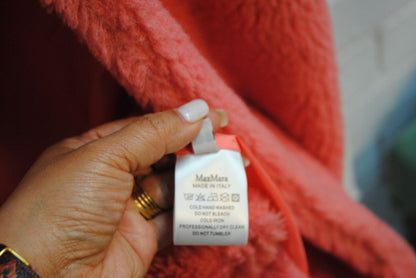 pink alpaca Max Mara Teddy bear icon coat, Length: Approx. 44 in Sleeve Length: Approx. 23 in Shoulder Width: Approx. 22 in Bust (pit to pit): Approx. 26 in Fit: Oversized cocoon silhouette