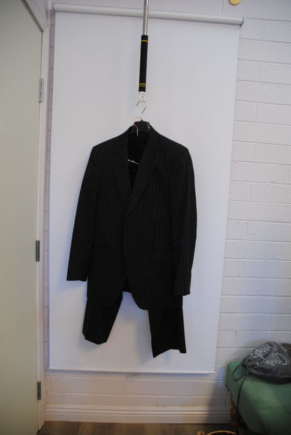 black and white pinstripes Dolce & Gabbana pinstripe suit, Dimensions (Approximate – Size 50 EU / 40 US) Blazer Chest (Pit to Pit): 21 in Blazer Length (Shoulder to Hem): 30.5 in Shoulder Width: 18 in Sleeve Length: 25 in Pants Waist: 34 in Inseam: 32 in