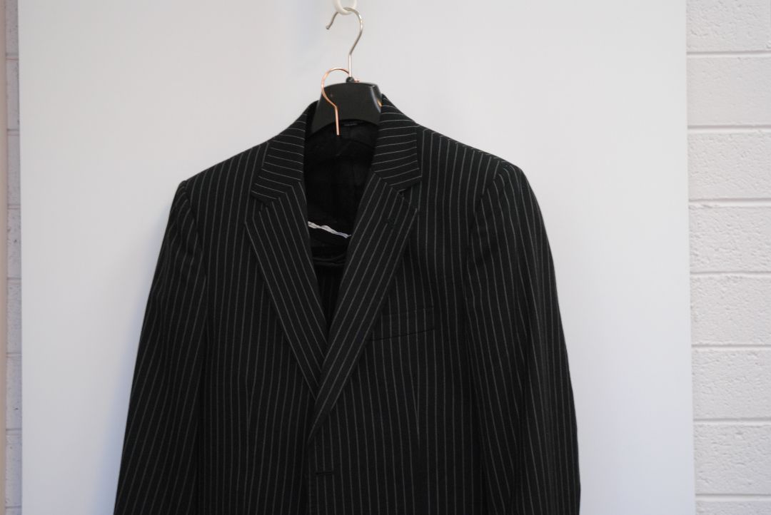 black and white pinstripes Dolce & Gabbana pinstripe suit, Dimensions (Approximate – Size 50 EU / 40 US) Blazer Chest (Pit to Pit): 21 in Blazer Length (Shoulder to Hem): 30.5 in Shoulder Width: 18 in Sleeve Length: 25 in Pants Waist: 34 in Inseam: 32 in