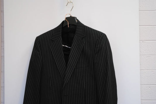 black and white pinstripes Dolce & Gabbana pinstripe suit, Dimensions (Approximate – Size 50 EU / 40 US) Blazer Chest (Pit to Pit): 21 in Blazer Length (Shoulder to Hem): 30.5 in Shoulder Width: 18 in Sleeve Length: 25 in Pants Waist: 34 in Inseam: 32 in