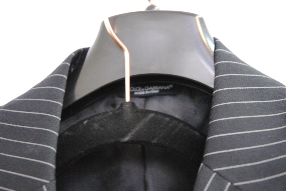 black and white pinstripes Dolce & Gabbana pinstripe suit, Dimensions (Approximate – Size 50 EU / 40 US) Blazer Chest (Pit to Pit): 21 in Blazer Length (Shoulder to Hem): 30.5 in Shoulder Width: 18 in Sleeve Length: 25 in Pants Waist: 34 in Inseam: 32 in