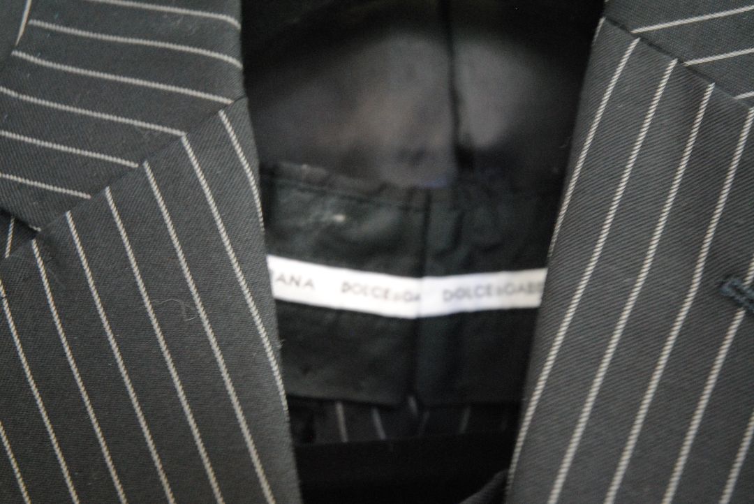 black and white pinstripes Dolce & Gabbana pinstripe suit, Dimensions (Approximate – Size 50 EU / 40 US) Blazer Chest (Pit to Pit): 21 in Blazer Length (Shoulder to Hem): 30.5 in Shoulder Width: 18 in Sleeve Length: 25 in Pants Waist: 34 in Inseam: 32 in