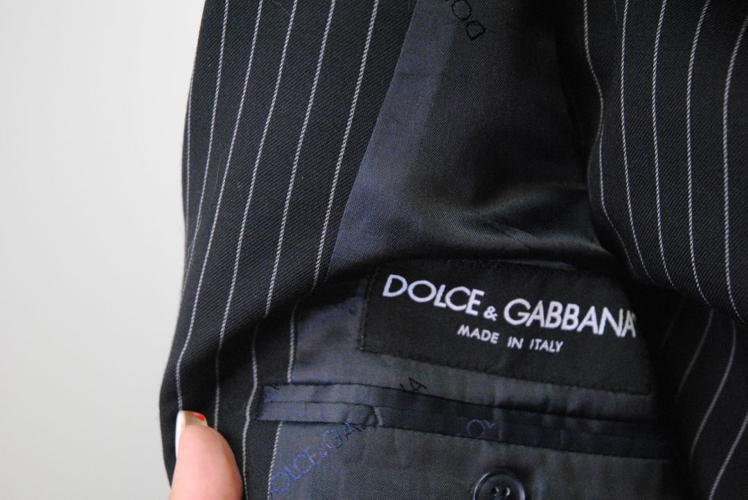 black and white pinstripes Dolce & Gabbana pinstripe suit, Dimensions (Approximate – Size 50 EU / 40 US) Blazer Chest (Pit to Pit): 21 in Blazer Length (Shoulder to Hem): 30.5 in Shoulder Width: 18 in Sleeve Length: 25 in Pants Waist: 34 in Inseam: 32 in