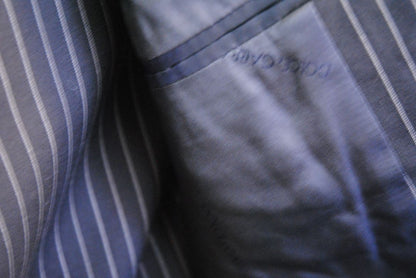 black and white pinstripes Dolce & Gabbana pinstripe suit, Dimensions (Approximate – Size 50 EU / 40 US) Blazer Chest (Pit to Pit): 21 in Blazer Length (Shoulder to Hem): 30.5 in Shoulder Width: 18 in Sleeve Length: 25 in Pants Waist: 34 in Inseam: 32 in