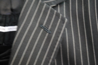 black and white pinstripes Dolce & Gabbana pinstripe suit, Dimensions (Approximate – Size 50 EU / 40 US) Blazer Chest (Pit to Pit): 21 in Blazer Length (Shoulder to Hem): 30.5 in Shoulder Width: 18 in Sleeve Length: 25 in Pants Waist: 34 in Inseam: 32 in