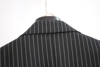 black and white pinstripes Dolce & Gabbana pinstripe suit, Dimensions (Approximate – Size 50 EU / 40 US) Blazer Chest (Pit to Pit): 21 in Blazer Length (Shoulder to Hem): 30.5 in Shoulder Width: 18 in Sleeve Length: 25 in Pants Waist: 34 in Inseam: 32 in