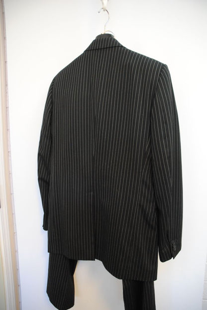 black and white pinstripes Dolce & Gabbana pinstripe suit, Dimensions (Approximate – Size 50 EU / 40 US) Blazer Chest (Pit to Pit): 21 in Blazer Length (Shoulder to Hem): 30.5 in Shoulder Width: 18 in Sleeve Length: 25 in Pants Waist: 34 in Inseam: 32 in