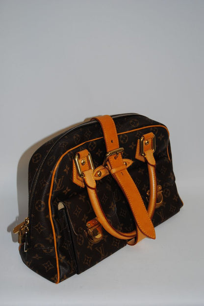 Monogram Louis Vuitton Manhattan GM, Length: 15.3 in Height: 9.4 in Depth: 6.7 in Handle Drop: 5 in