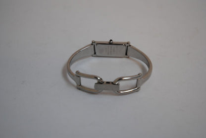 black and silver Gucci rectangle bangle watch, Case Dimensions: Approx. 15 mm width x 35 mm height Band Width: Approx. 10 mm