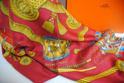 red and gold Hermes “Sous l’Égide de Mars” Silk Scarf (Vintage Red & Gold), Size: 90 cm x 90 cm (35.4” x 35.4”)