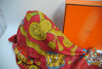red and gold Hermes “Sous l’Égide de Mars” Silk Scarf (Vintage Red & Gold), Size: 90 cm x 90 cm (35.4” x 35.4”)