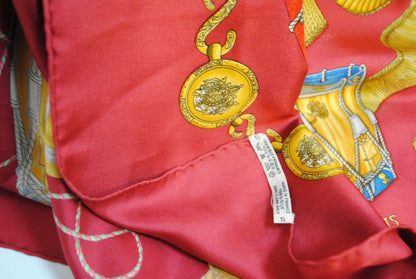 red and gold Hermes “Sous l’Égide de Mars” Silk Scarf (Vintage Red & Gold), Size: 90 cm x 90 cm (35.4” x 35.4”)