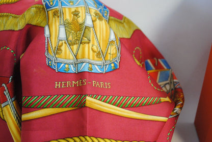 red and gold Hermes “Sous l’Égide de Mars” Silk Scarf (Vintage Red & Gold), Size: 90 cm x 90 cm (35.4” x 35.4”)