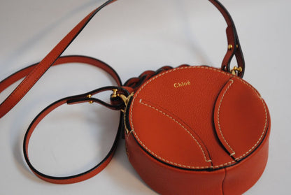 rich cognac brown Chloe Designer bag, Approx. 7” W x 7” H x 2.5” D Strap Drop: 20” adjustable crossbody strap