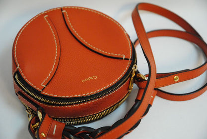 rich cognac brown Chloe Designer bag, Approx. 7” W x 7” H x 2.5” D Strap Drop: 20” adjustable crossbody strap