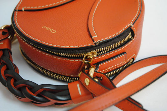 rich cognac brown Chloe Designer bag, Approx. 7” W x 7” H x 2.5” D Strap Drop: 20” adjustable crossbody strap