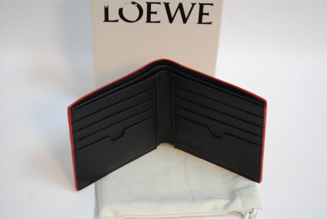 mustard yellow Loewe Embossed anagram bifold wallet, Length: 4.3 in (11 cm) Height: 3.5 in (9 cm) Depth: 0.6 in (1.5 cm)