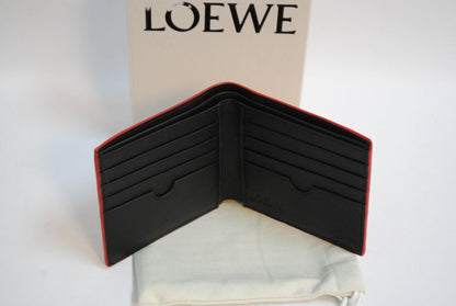 mustard yellow Loewe Embossed anagram bifold wallet, Length: 4.3 in (11 cm) Height: 3.5 in (9 cm) Depth: 0.6 in (1.5 cm)
