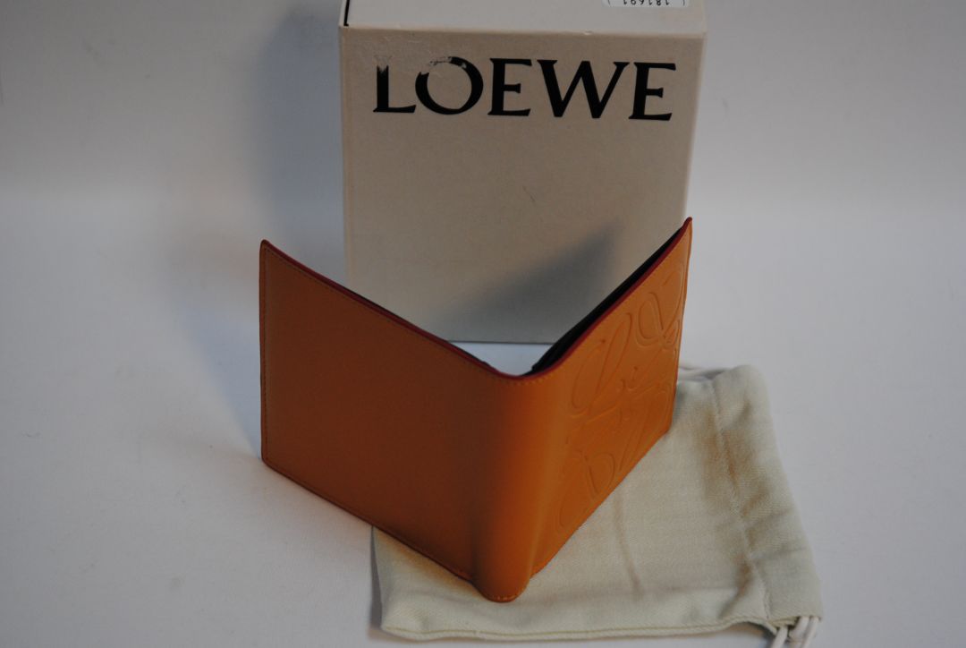 mustard yellow Loewe Embossed anagram bifold wallet, Length: 4.3 in (11 cm) Height: 3.5 in (9 cm) Depth: 0.6 in (1.5 cm)