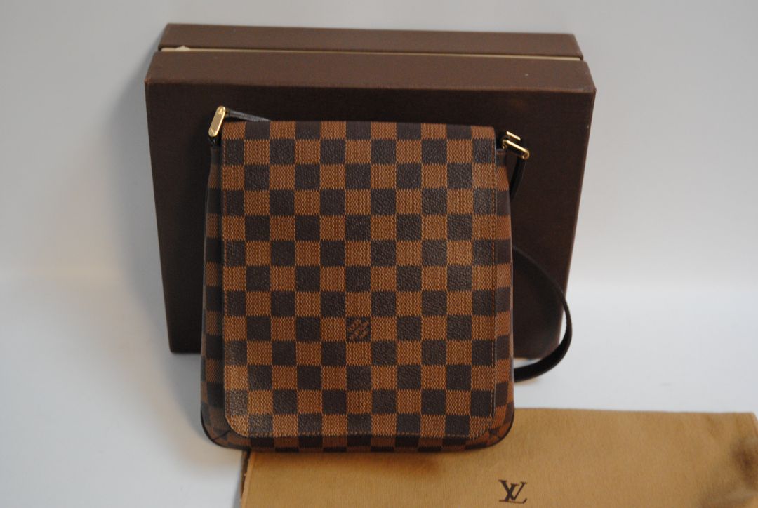 damier pattern Louis Vuitton damier bag, Length: 11 in (28 cm) Height: 10 in (25 cm) Depth: 3 in (8 cm) Strap Drop: Adjustable 15 – 22 in (38 – 55 cm)