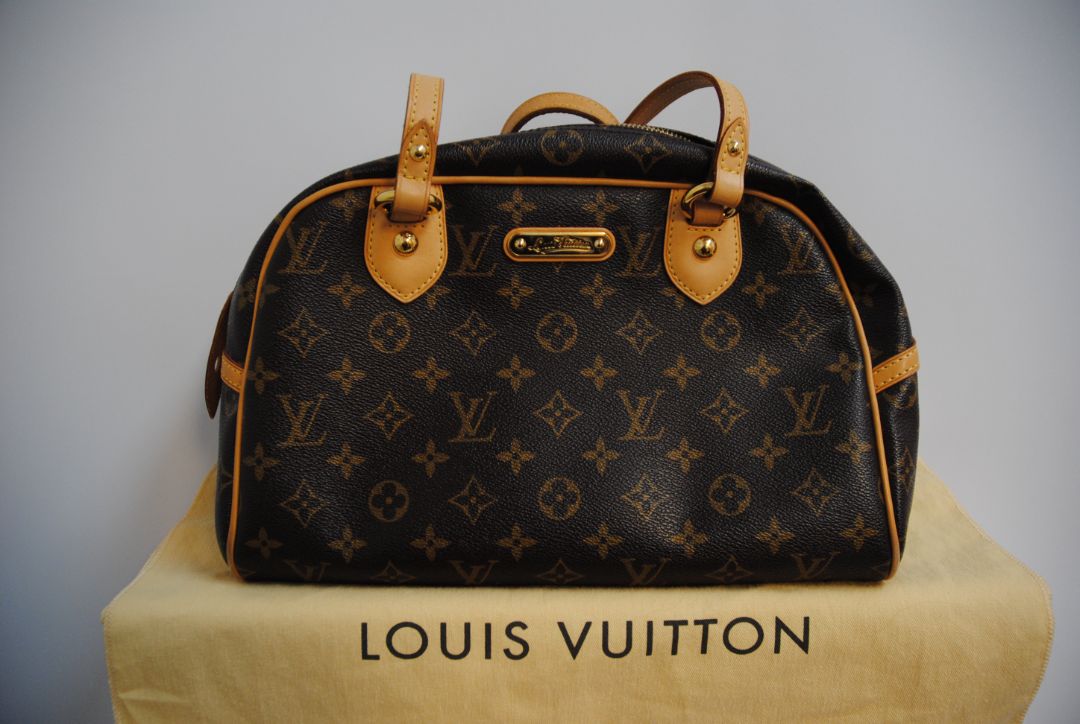 monogram canvas Louis Vuitton Tivoli PM monogram canvas satchel, Length: 14.2 in (36 cm) at widest point Height: 8.3 in (21 cm) Depth: 6.7 in (17 cm) Handle Drop: 6 in (15 cm)