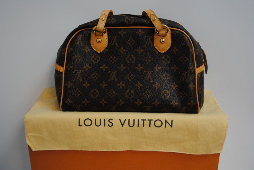 monogram canvas Louis Vuitton Tivoli PM monogram canvas satchel, Length: 14.2 in (36 cm) at widest point Height: 8.3 in (21 cm) Depth: 6.7 in (17 cm) Handle Drop: 6 in (15 cm)