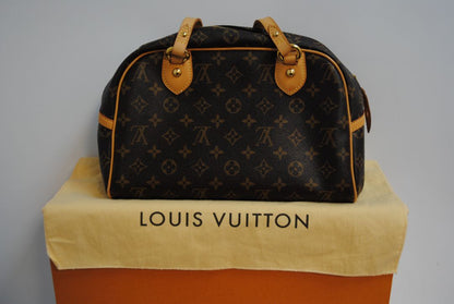 monogram canvas Louis Vuitton Tivoli PM monogram canvas satchel, Length: 14.2 in (36 cm) at widest point Height: 8.3 in (21 cm) Depth: 6.7 in (17 cm) Handle Drop: 6 in (15 cm)