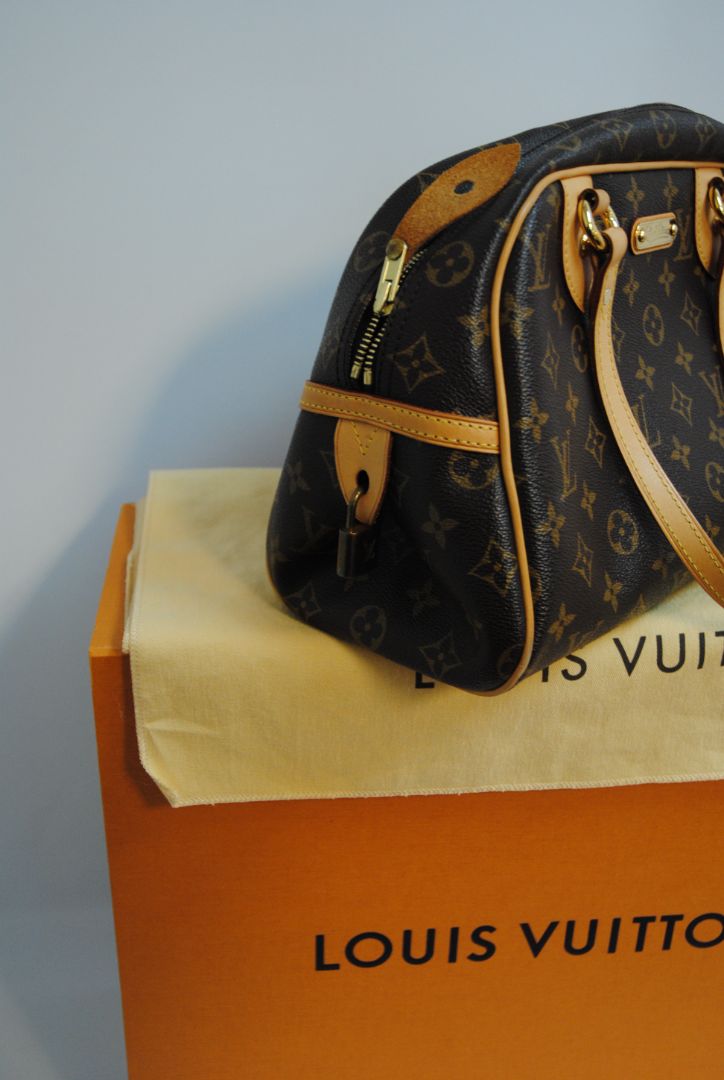 monogram canvas Louis Vuitton Tivoli PM monogram canvas satchel, Length: 14.2 in (36 cm) at widest point Height: 8.3 in (21 cm) Depth: 6.7 in (17 cm) Handle Drop: 6 in (15 cm)