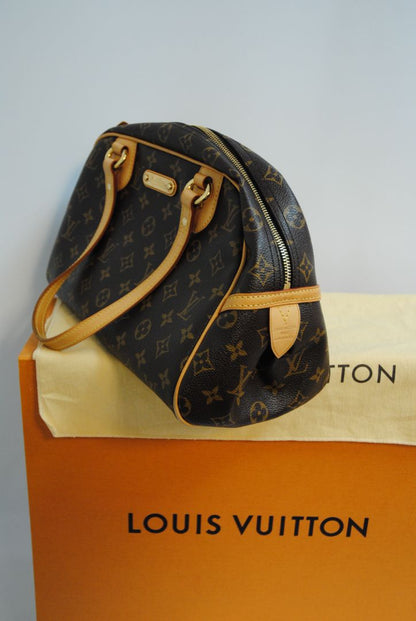 monogram canvas Louis Vuitton Tivoli PM monogram canvas satchel, Length: 14.2 in (36 cm) at widest point Height: 8.3 in (21 cm) Depth: 6.7 in (17 cm) Handle Drop: 6 in (15 cm)